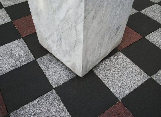 column with tiles black grey and brown floor tiles